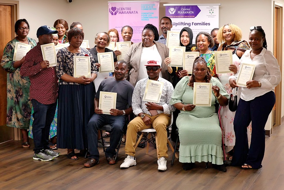 Centre Maranata volunteers and board members celebrating their training
